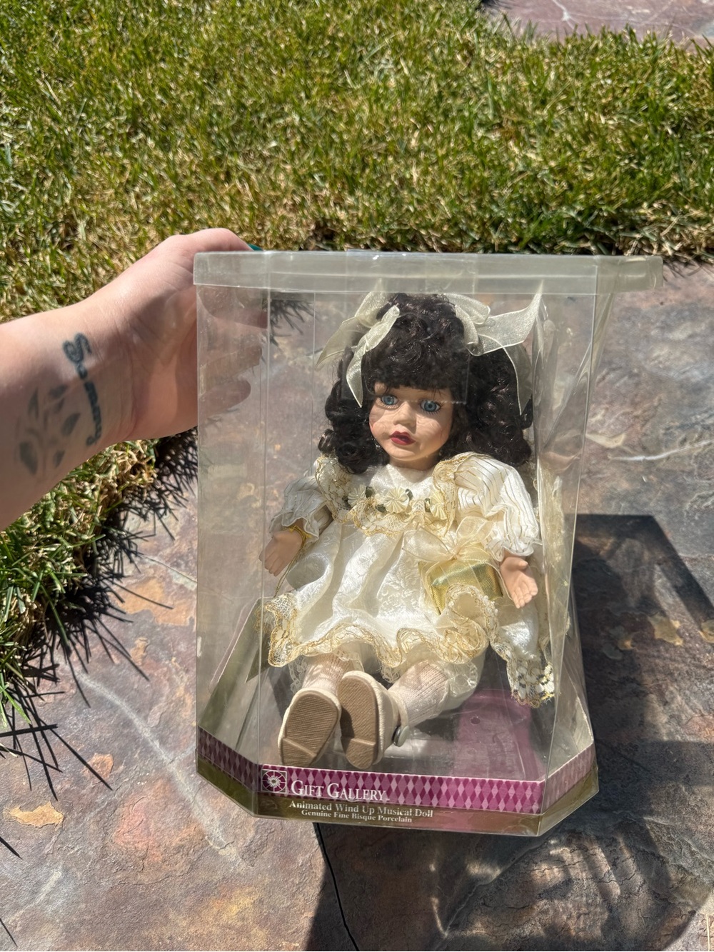 Porcelain Collectible Doll in Ivory Dress